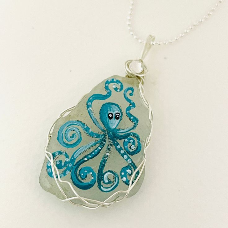 "Teal Octopus sea glass necklace - Hand painted Silver plated 18\" chain with Swarovski crystal. painted and crafted to order. Please do take a minute to view my many one of a kind hand painted items :-)" Artistic Czech Glass Jewelry For Gifts, Artistic Clear Jewelry For Gifts, Nickel Free Recycled Glass Necklace Gift, Whimsical Blue Necklace For Gift, Hand Painted Czech Glass Jewelry For Gift, Hand Painted Turquoise Jewelry Gift, Turquoise Hand Painted Jewelry Gift, Whimsical Blue Necklace For Gifts, White Recycled Glass Jewelry Gift