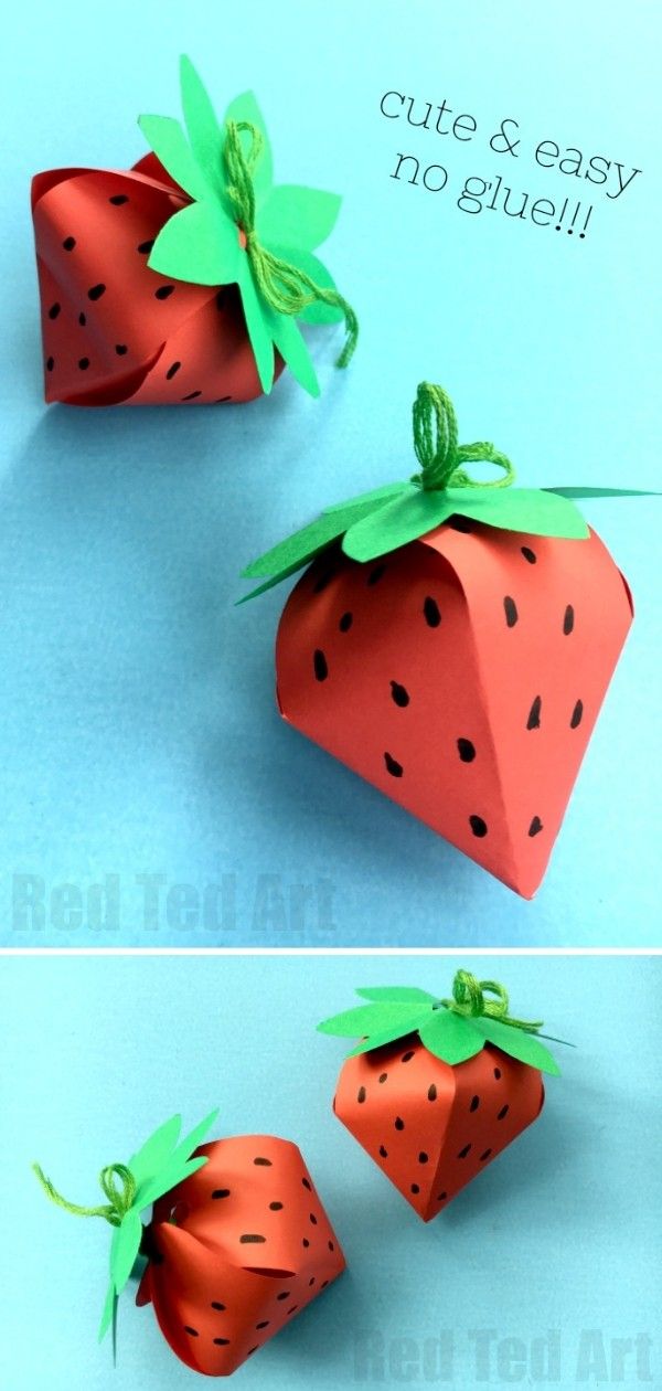 the paper strawberries are cut and placed on top of each other