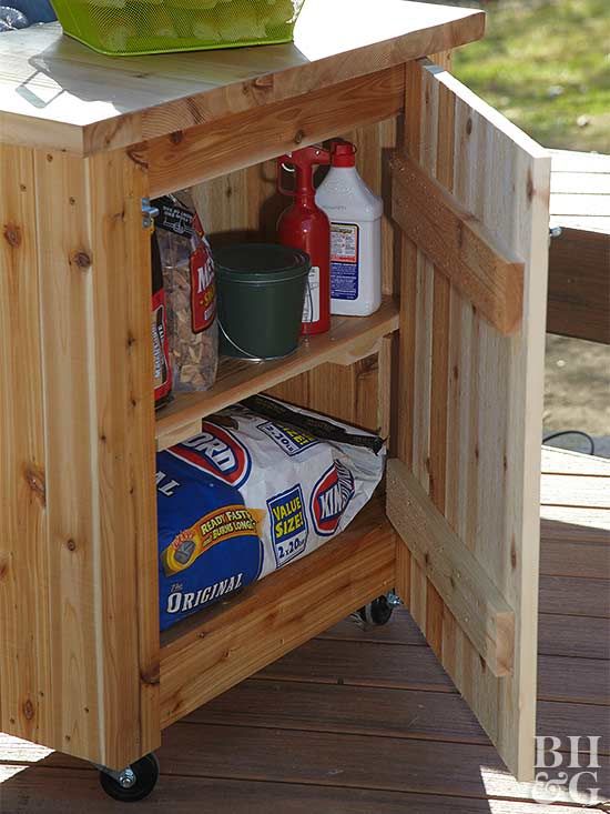 a small wooden cart with food on it