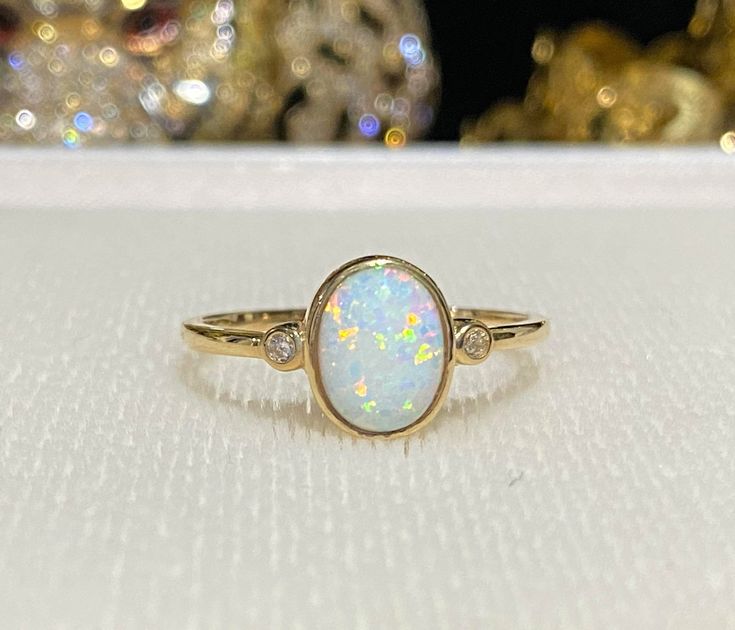 Vintage 14K Solid Yellow Gold White Opal & White Topaz Ring...Marked 14K... Total of weight 1.5gr... Measure of opal 8 x 6MMIt's in very good condition. Topas Ring, Cardboard Jewelry Boxes, Opal White, Domed Ring, Classic Gold, Vintage Ring, White Opal, Topaz Ring, White Topaz