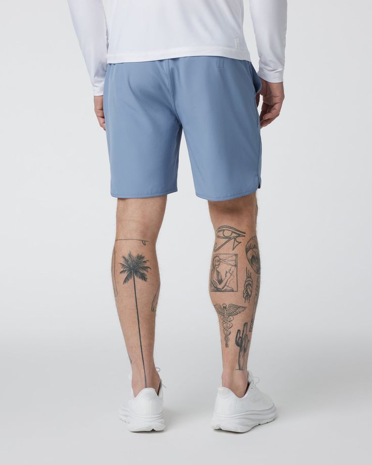 The ultimate in versatility, the Banks Shorts are made from partially recycled plastic bottles to take you from land to sea and beyond. It’s an athletic short built with a scalloped leg for your most universal performance item. | Vuori Banks Shorts | Chambray | XXL Vuori makes premium performance apparel inspired by the active Coastal California lifestyle; an integration of fitness, surf, sport, and art. Breaking down the boundaries of traditional activewear, we are a new perspective on performa Summer Workout Shorts Made Of Recycled Polyester, Recycled Polyester Athletic Shorts With Elastic Waistband, Recycled Polyester Activewear With Elastic Waistband, Recycled Polyester Relaxed Fit Shorts, Short Length Activewear With Elastic Waistband, Recycled Polyester Athletic Shorts In Athleisure Style, Functional Swim Trunks With Relaxed Fit For Workout, Recycled Polyester Relaxed Fit Activewear Shorts, Functional Relaxed Fit Swim Trunks For Workout