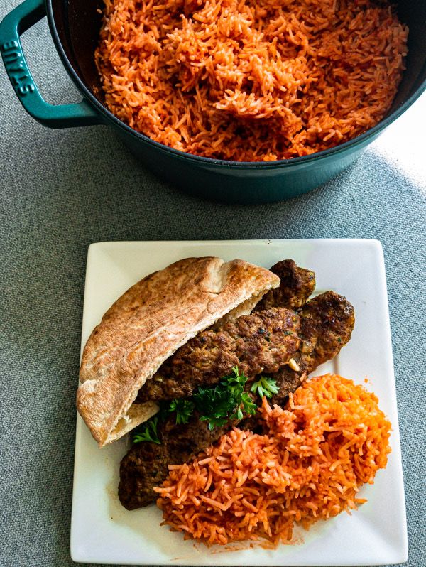 the meal is ready to be eaten on the table next to the casserole dish