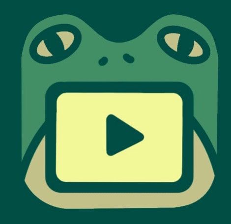 a green frog with eyes and a video player on it's chest is looking at the camera