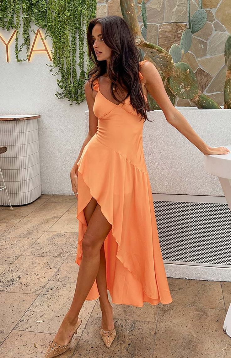 Orange Maxi Dress

How to style:
This orange maxi dress () is the perfect homecoming dress! From the leg slit to the frills, this dress is absolutely stunning. Pair with a nude kitten heels () and a shoulder bag () and you are ready to party!

Features:
  
 * Light weight material 
 * Maxi length 
 * Leg slit 
 * Slight stretch material 
 * Lined 
 * Thin adjustable straps with ruffle detailing 
 * Invisible side zipper  
 * Bias cut Prom Inspo, Prom Midi Dress, Orange Maxi Dress, Semi Formal Dresses, Long Prom Dresses, Beginning Boutique, Strapless Tops, Orange Dress, Prom Party Dresses