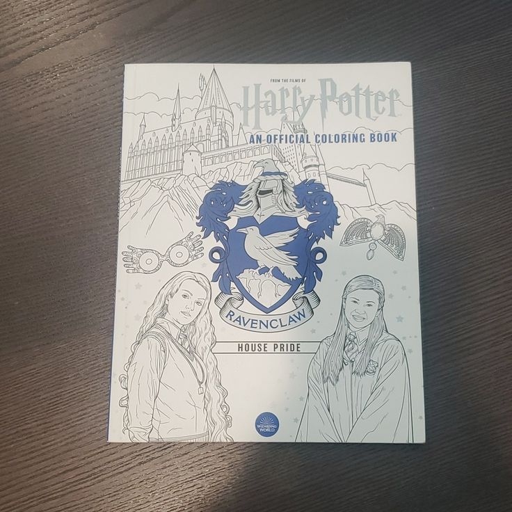 a harry potter coloring book on a table