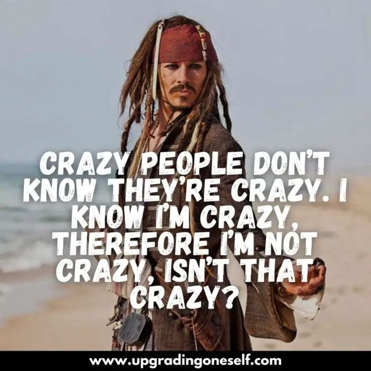 a man with dreadlocks on his head standing in front of the ocean and saying crazy people don't know they're crazy