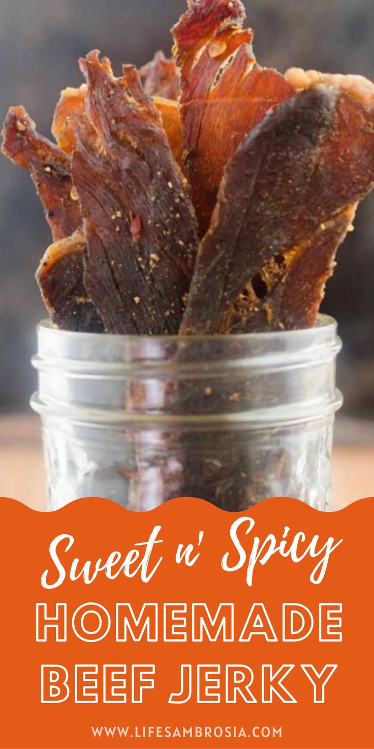 sweet and spicy homemade beef jerk in a mason jar with text overlay that reads sweet and spicy homemade beef jerry