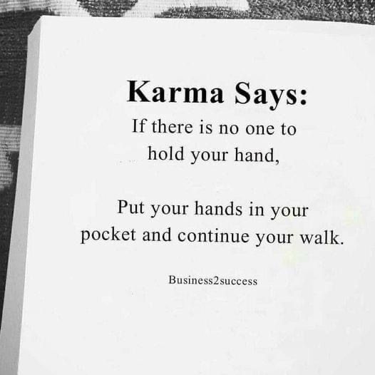 a piece of paper with a quote on it that says karma says if there is no one to hold your hand, put your hands in your pocket and continue your walk