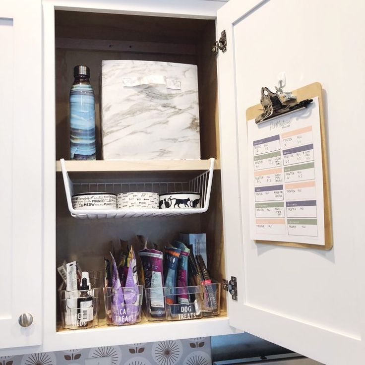 a bathroom cabinet filled with personal care items