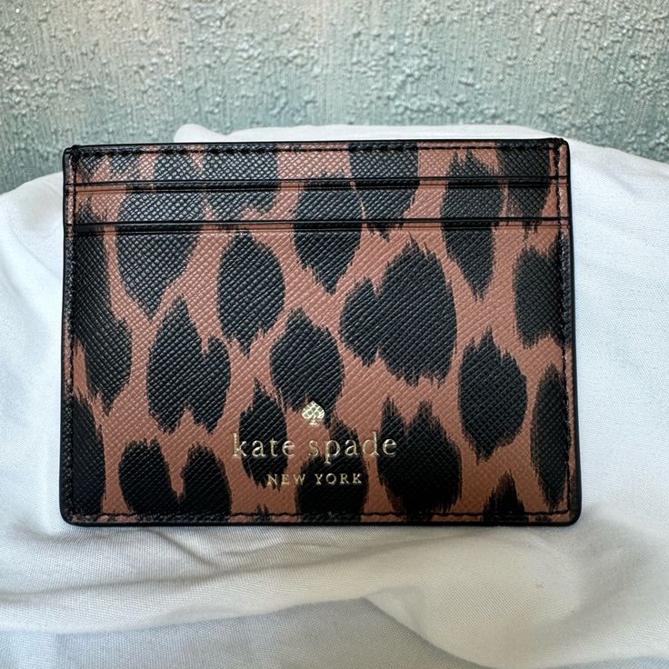 New Without Tags! Great For Every Day Use! Kate Spade Leopard Print Cardholder. Chic Brown Card Holder, Chic Brown Card Holder For Everyday Use, Chic Brown Card Holder With Card Slots, Chic Brown Card Holder With Slots, Kate Spade Card Holder For Everyday Use, Kate Spade Brown Rectangular Wallets, Kate Spade Brown Everyday Wallet, Trendy Brown Card Holder For Travel, Trendy Brown Card Holder For Daily Use