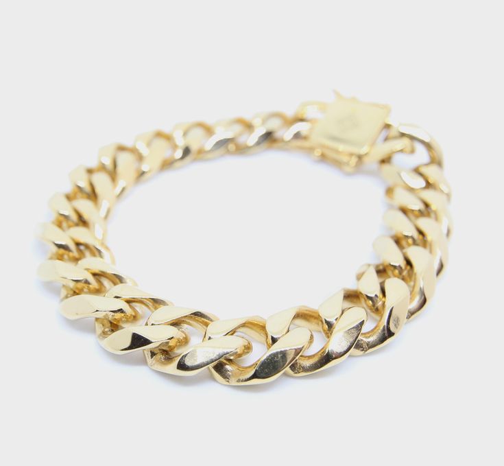 luxury 18k cuban link bracelet in size 8inch Luxury Cuban Link Bracelet With Chunky Chain, Modern Bracelets With Chunky Cuban Link Chain, Modern Chunky Chain Cuban Link Bracelets, Luxury Bracelets With Chunky Cuban Link Chain, Modern Cuban Link Chain Bracelet With Solid Construction, Classic Gold Chain Cuban Link Bracelets, Classic Cuban Link Bracelet, Tarnish Resistant, Luxury 14k Gold Cuban Link Bracelet, Luxury Curb Chain Link Bracelets