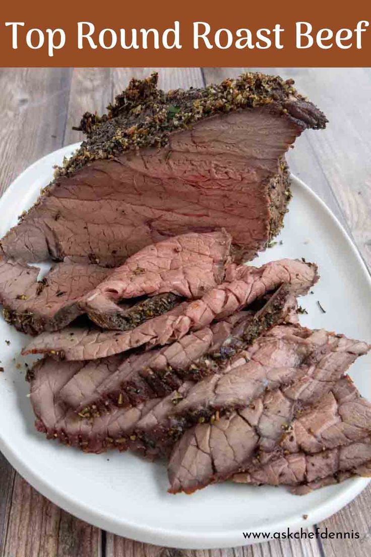 sliced beef on a white plate with the words top round roast beef over it's side