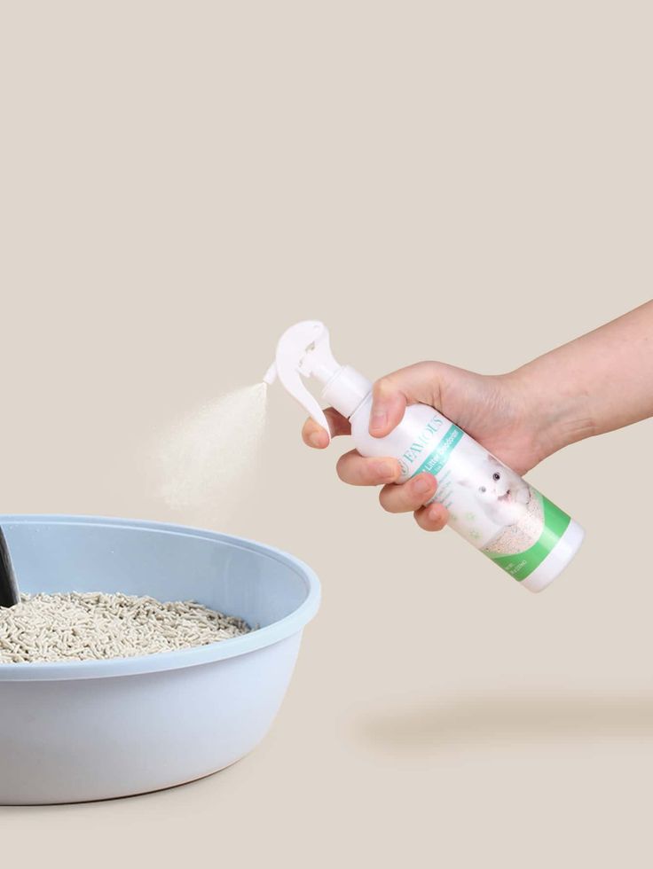 a person is sprinkling sand into a bowl