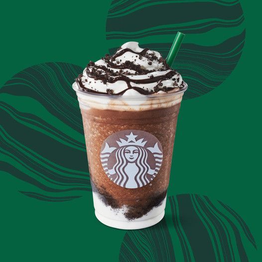 a starbucks drink with whipped cream and chocolate