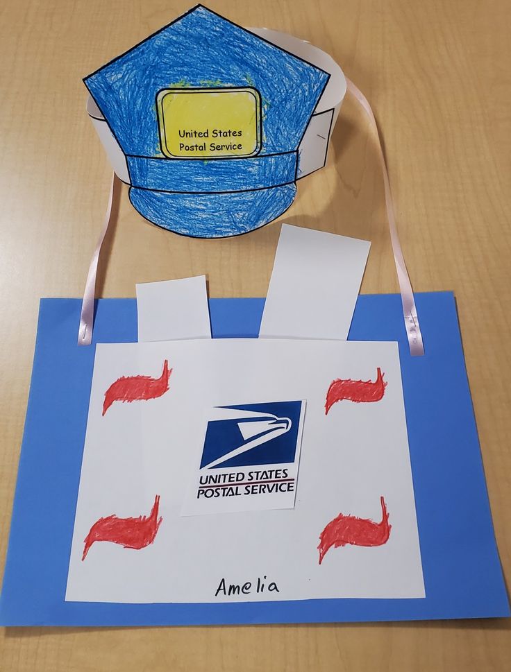 a paper bag that is shaped like an envelope with the postal service logo on it