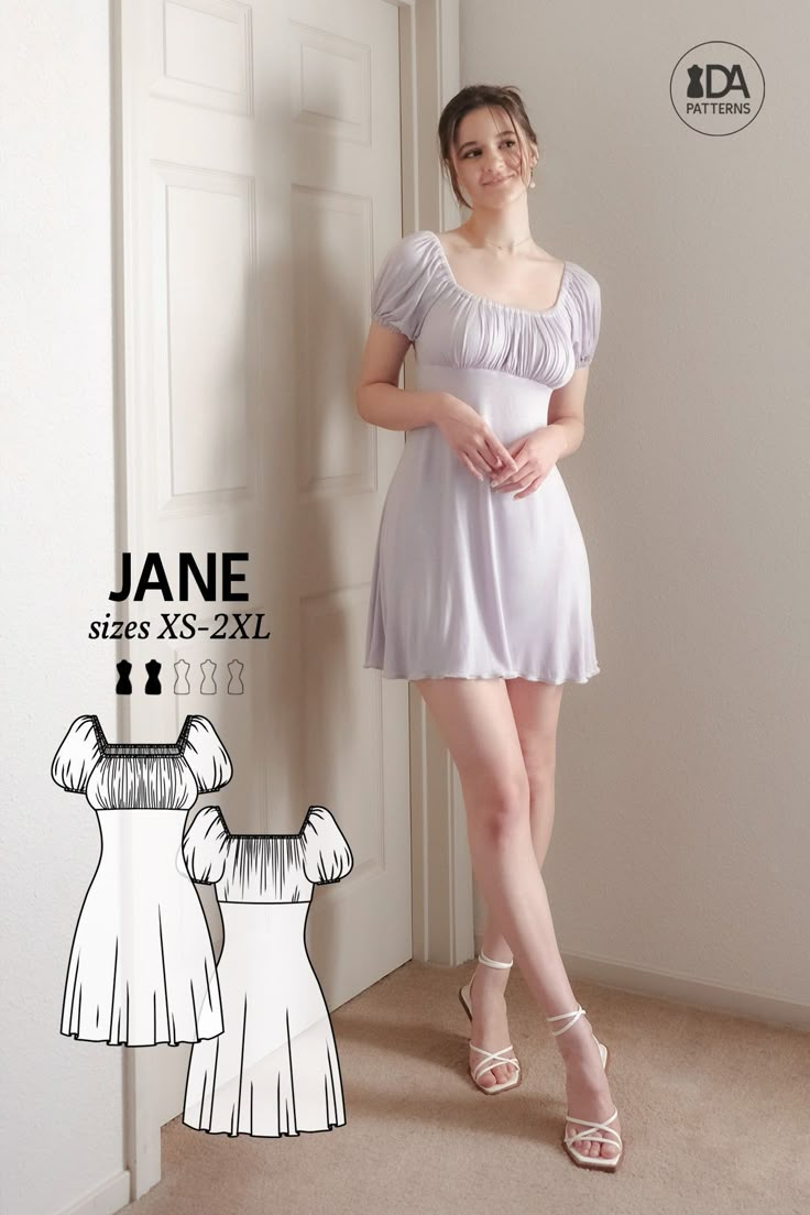 a woman standing next to a door wearing a white dress