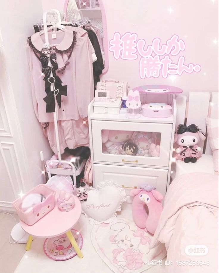 a pink room with clothes and toys on display in the corner next to a bed