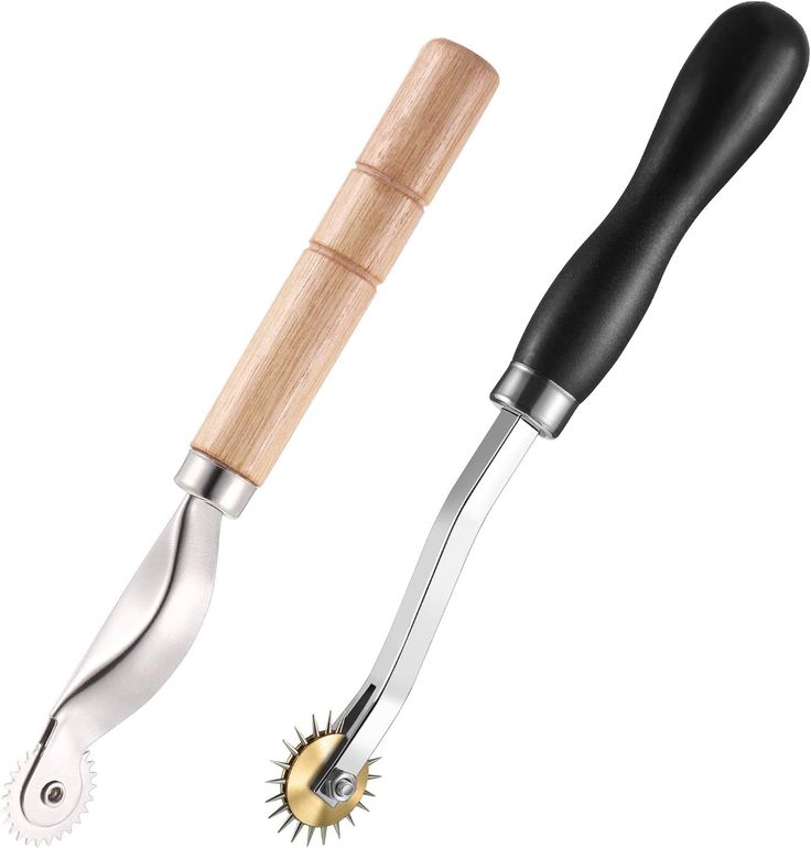 two different types of kitchen utensils with wooden handles and metal tips, one black and the other silver