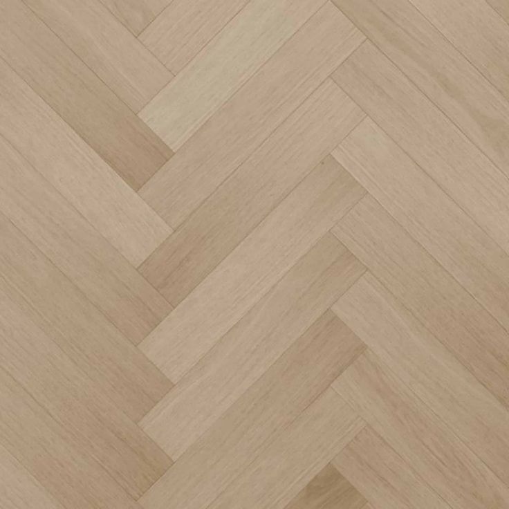 an image of wood flooring that looks like herringbones