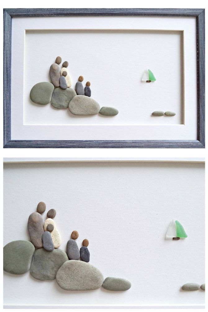 two framed pictures with rocks and mushrooms on the bottom one is made out of paper