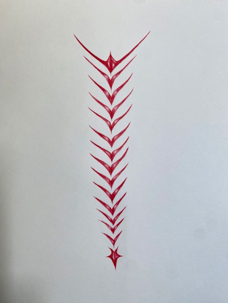 a drawing of a red plant on a white wall