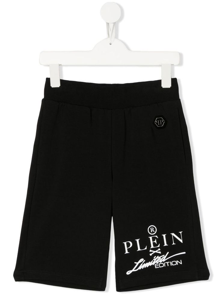 Black stretch cotton logo track shorts from Philipp Plein Junior featuring logo patch to the front, straight leg and elasticated waistband. | Philipp Plein Junior Logo Track Shorts Casual Shorts With Logo Print, Track Shorts, Philipp Plein, Cotton Logo, Boys Casual, Shorts Black, Black Stretch, Boy Shorts, Cotton Spandex