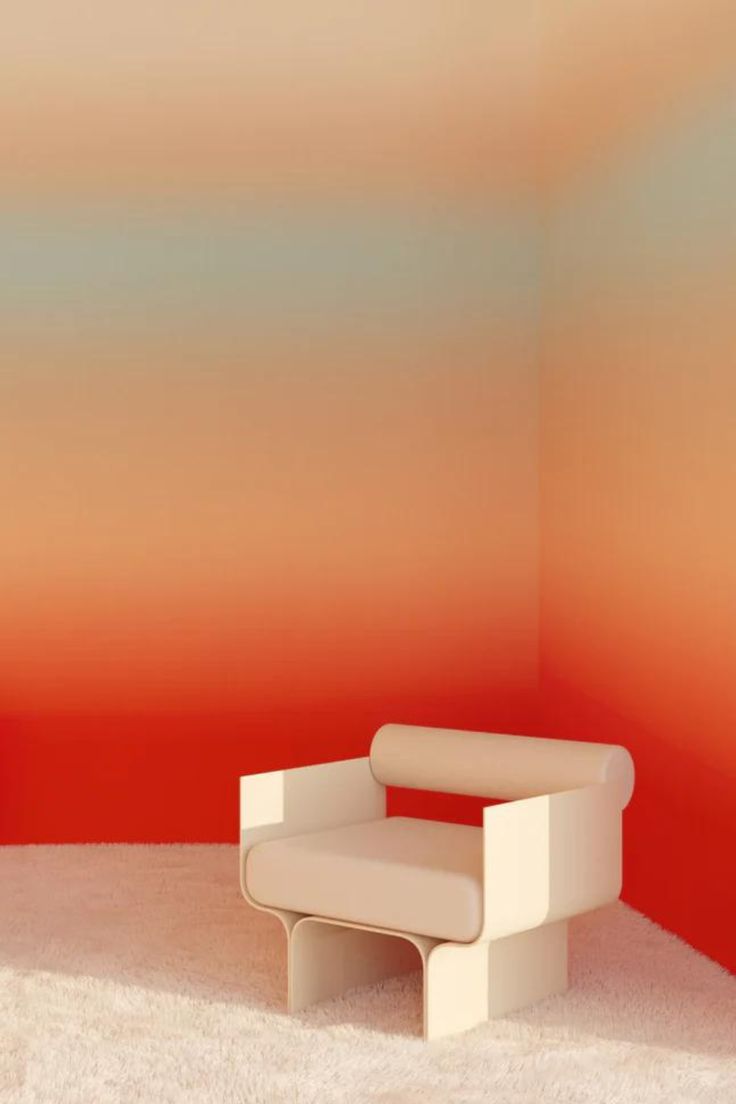 a white chair sitting on top of a carpeted floor next to a red wall