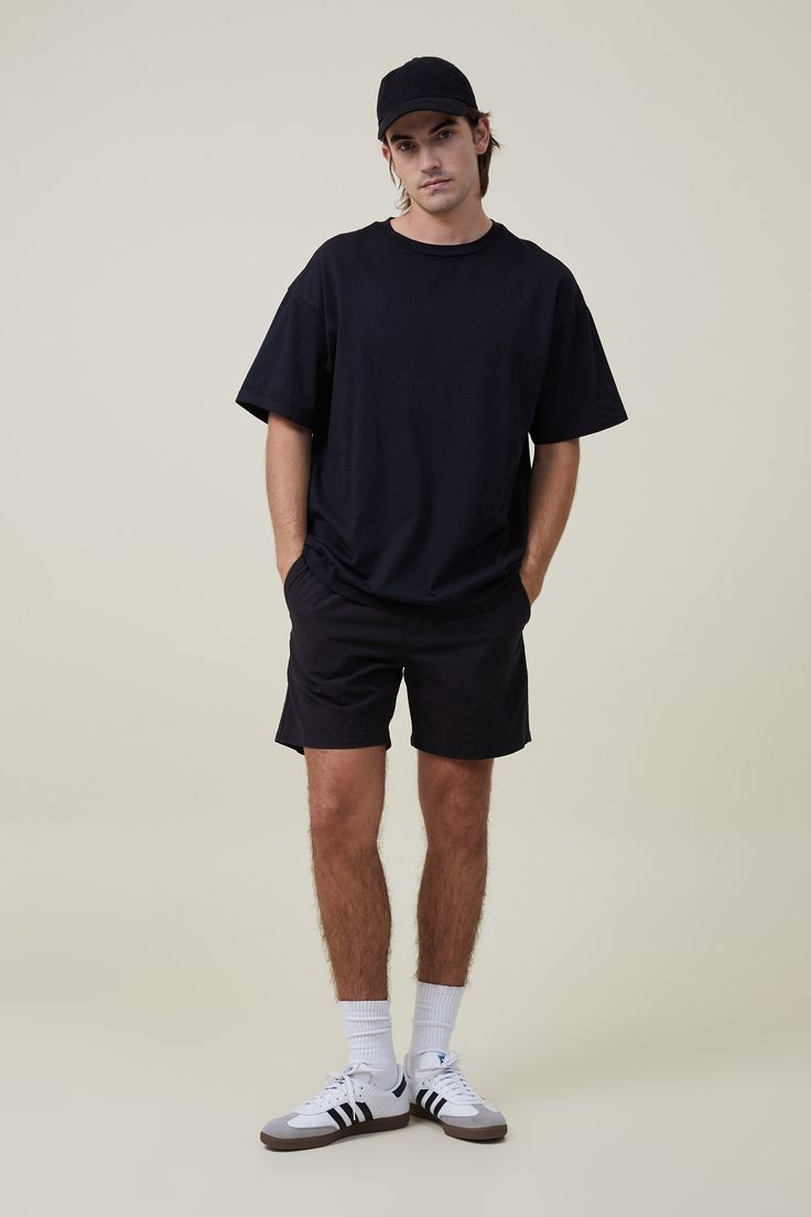 It's all in the name. The Easy Short is exactly that! Comfortable and cool with stretch for added comfort, these shorts will quickly become your go-to. Pair with a basic tee and denim jacket for effortless style.  Features:   Texture woven cottonRelaxed fitElasticated waistband with flat cotton draw cordFront side pocketsSingle back pocket Mens Clothing Casual Summer, Men’s Active Fashion, Mens Athletic Style, Men’s Tops, Mens Trendy Outfits Summer, Men’s Shorts, Basic Outfits Men, Black Tshirt Outfit Men, Men’s Summer Casual Outfits