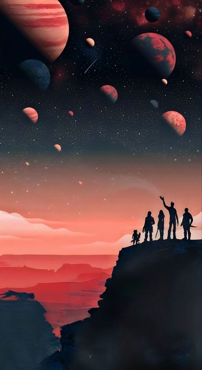 people standing on top of a cliff looking at planets