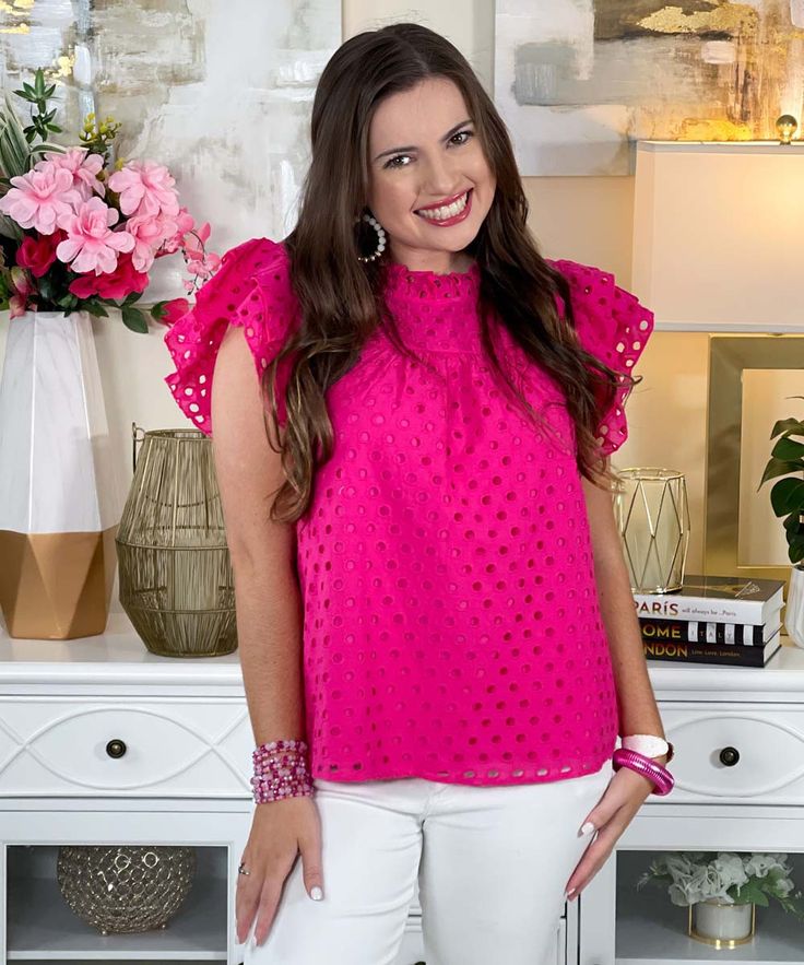 Introducing our "Swing Me Around Top," a delightful and versatile addition to your wardrobe, available in sizes S-L. Crafted from 100% cotton, this hot pink top combines comfort with style for all-day wear.
Featuring a charming eyelet design, this top boasts a frilled neck that adds a touch of femininity. The layer ruffled shoulder detail adds a playful flair, while the back buttoned closure provides both functionality and elegance. To add texture and interest, we've included wrinkle detail throughout the fabric.
This top is perfect for a variety of occasions. Dress it down with jeans or shorts for a casual daytime look, or pair it with a skirt or trousers for a more polished ensemble. Its breathable cotton fabric ensures you stay cool and comfortable, no matter the setting.
Embrace the wh Cotton Eyelet Top For Day Out, Spring Cotton Eyelet Tops, Feminine Eyelet Tops For Day Out, Feminine Summer Tops With Eyelet Details, Feminine Eyelet Tops For Summer, Chic Sleeveless Top With Eyelet Details, Chic Sleeveless Eyelet Top, Sleeveless Eyelet Top For Spring, Feminine Eyelet Tops For Spring