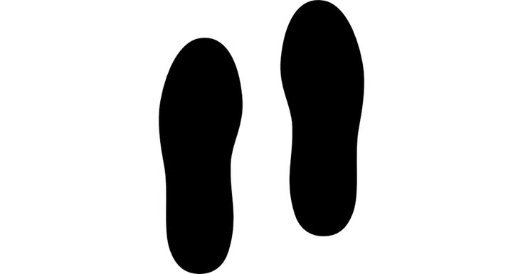 a pair of black footprints on a white background