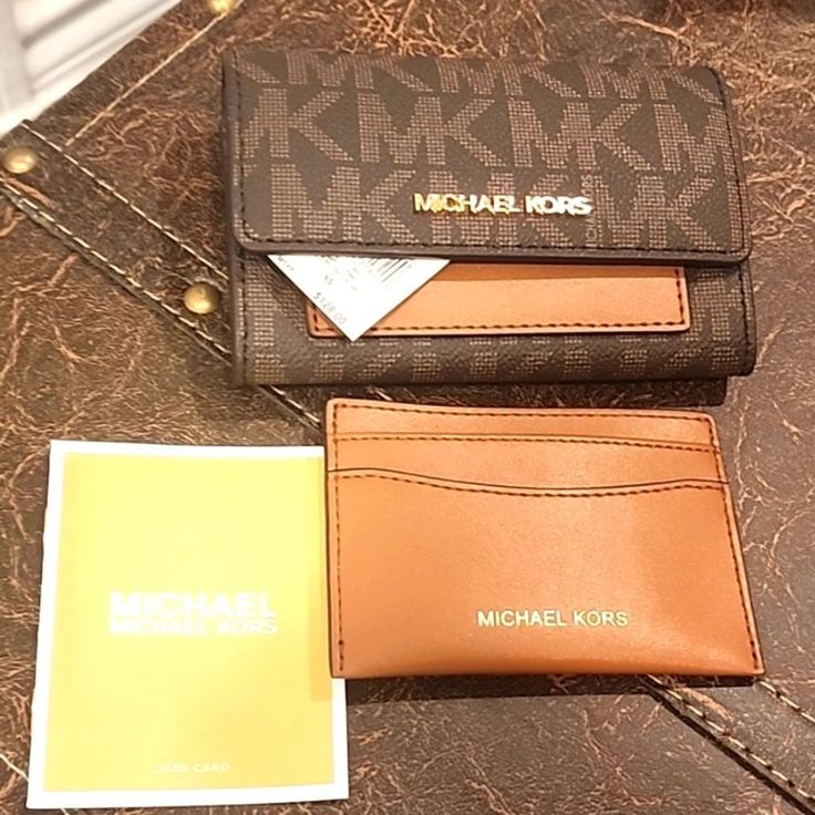 New Specs In The Photos See More Mk In My Closet Michael Kors Wallets With Card Slots, Classic Brown Michael Kors Wallet, Brown Wallets With Logo For Everyday Use, Michael Kors Brown Daily Wallet, Classic Wallets With Logo For Everyday Use, Michael Kors Brown Wallet With Removable Pouch, Michael Kors Wallets With Interior Card Slots, Michael Kors Brown Bag With Interior Card Slots, Michael Kors Brown Travel Wallet