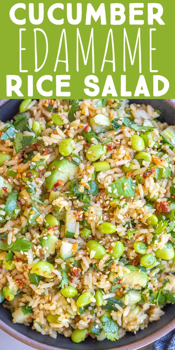 a bowl filled with rice and vegetables on top of a table