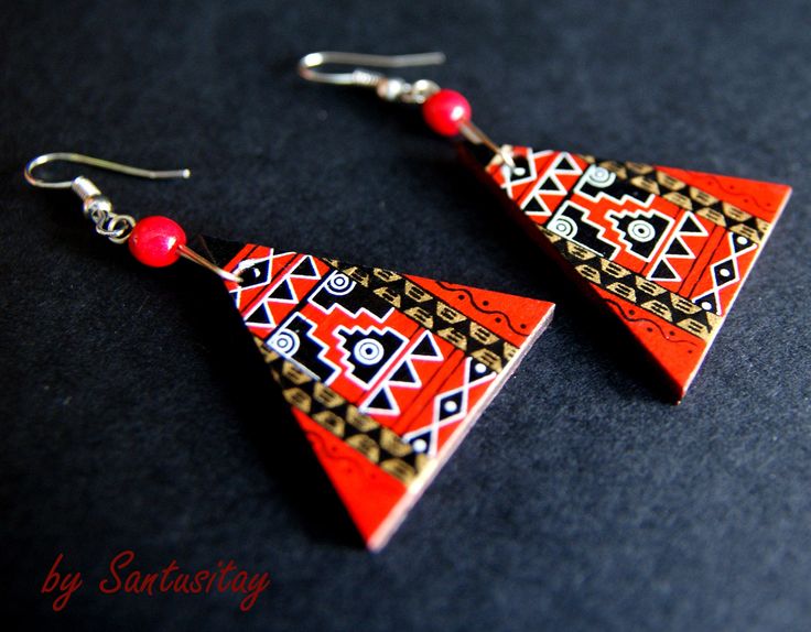 Amazing light earrings hand painted in ethnic designs on coconut, decorated achira seeds. Dimensions: width 2 cm (first picture) 3 cm (1'') -second picture length with hooks: 6 cm (first picture) -7 cm (2,70'') (second picture) Red Handmade Earrings For Festivals, Handmade Red Earrings For Festivals, Artistic Red Earrings Gift, Traditional Red Earrings For Festival, Artisan Red Festival Earrings, Artisan Red Earrings For Festival, Red Hand Painted Jewelry For Festivals, Red Fair Trade Jewelry As A Gift, Hand Painted Earrings For Festivals