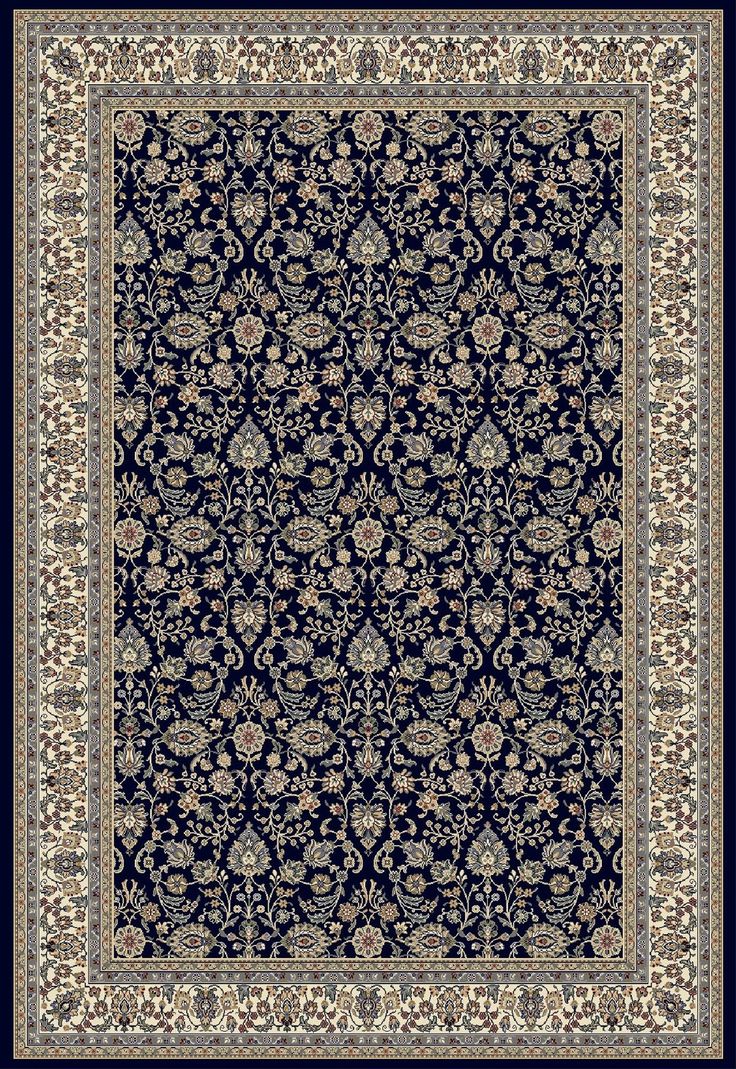 a black and white rug with an intricate design on the bottom, in front of a blue background