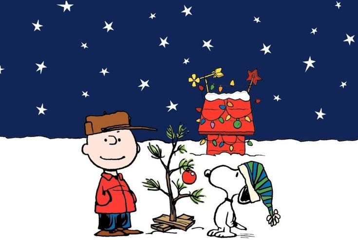 a charlie brown christmas card with a tree and a man standing next to it in the snow