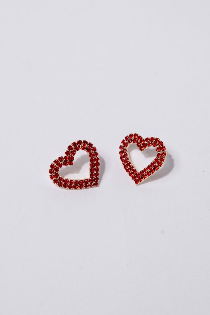 Add a touch of elegance to your Valentine's Day look with our Brianna Heart Pave Drop Earrings. Featuring stunning heart-shaped pave stones, these earrings will make a statement of love and sophistication. Made with high-quality materials, they are sure to be a treasured addition to any jewelry collection. SizeHEIGHT: 0.75"WIDTH: 0.9" QualityMade with Quality Materials for Endurance. ImportedE7074 Gold Heart Earrings With Rhinestones For Valentine's Day, Red Heart-shaped Rhinestone Jewelry, Heart-shaped Rhinestone Earrings For Gift, Heart Cut Earrings For Valentine's Day Party, Glamorous Heart Earrings For Valentine's Day, Valentine's Day Party Heart Earrings With Open Heart Shape, Valentine's Day Heart Cut Earrings For Party, Red Double Heart Earrings For Party, Double Heart Earrings For Valentine's Day Party