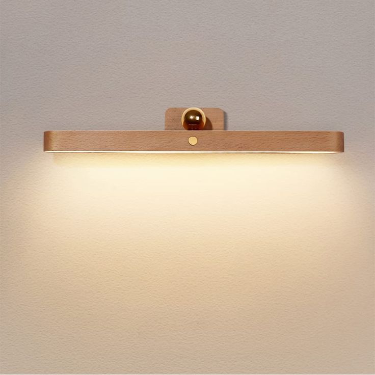 a light that is on the side of a wall with it's lights on