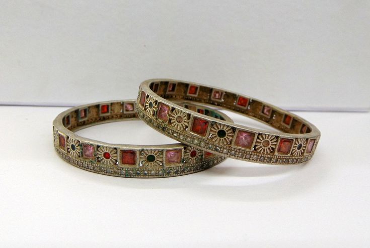 Vintage Antique Tribal Old Silver Bangle Bracelet Pair set 2pc. from Rajastahn India. Great handmade design adorn with glass stones. Good for jewelry collection. Best gift item. Daily and easy wear. Note - Please check pictures carefully for more details. You can even buy a single pair. Inner Diameter - 6 cm (2.36 inches) Inner Circumference - 18.84 cm (7.4 inches) Width - 10 mm Weight - 60 grams Material - Sterling Silver & original old worn pair. Bohemian Hand Set Metal Bracelets, Bohemian Bangle With Stone Setting, Bohemian Jeweled Bangle As A Gift, Bohemian Jeweled Bracelets For Wedding, Bohemian Hand Set Bangle, Bohemian Jeweled Wedding Bracelets, Bohemian Jeweled Bracelets For Festive Occasions, Bohemian Jeweled Bracelet For Festive Occasions, Festive Bohemian Jeweled Bracelets