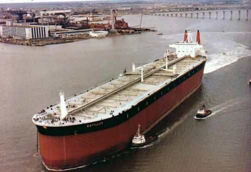 a large cargo ship sailing in the water