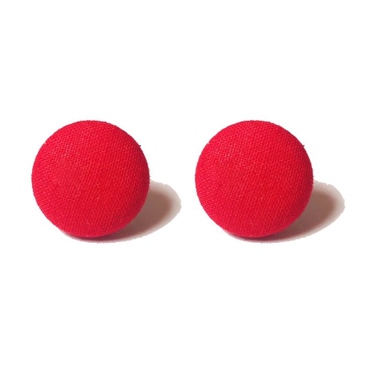 two red buttons sitting on top of each other