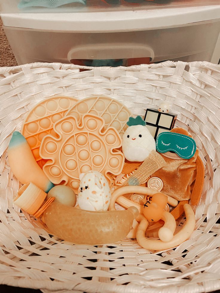 a wicker basket filled with lots of toys