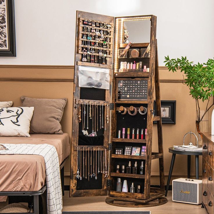 a room with a bed, mirror and shelves on the wall next to each other