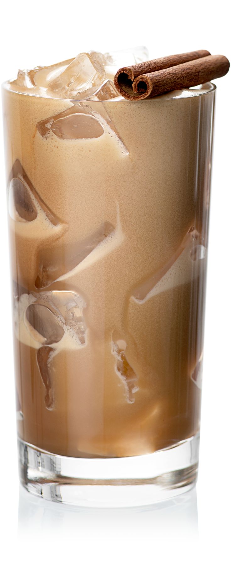 a tall glass filled with ice and cinnamon