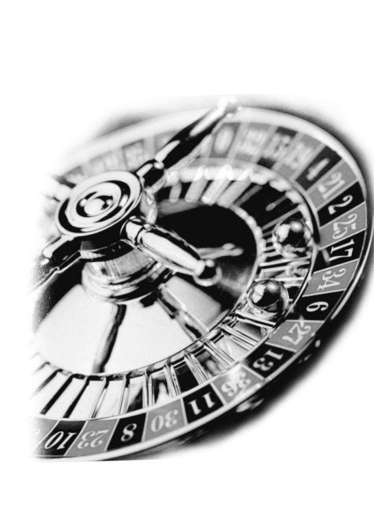 a black and white photo of a clock