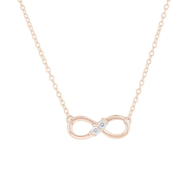 Complete your look of timeless elegance with this 'Always & Forever' Infinity Diamond Necklace! Crafted with two round brilliant diamonds nestled together in a 14 karat gold infinity symbol, it hangs perfectly on an 18 inch chain. Perfect for layering or wearing solo, 1/10 carat of diamonds will make sure you shine, always and forever!