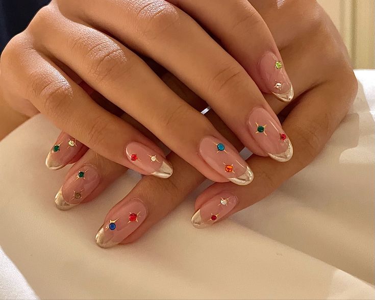 Nail Jewels Simple, Eras Tour Nails Bejeweled, Bejeweled French Tips, Colorful Gems Nails, Gold French Tip Nails With Gems, French Nails With Rhinestones Diamonds, Nails With Colored Rhinestones, Colored Rhinestone Nails, Eras Tour Nails French Tips