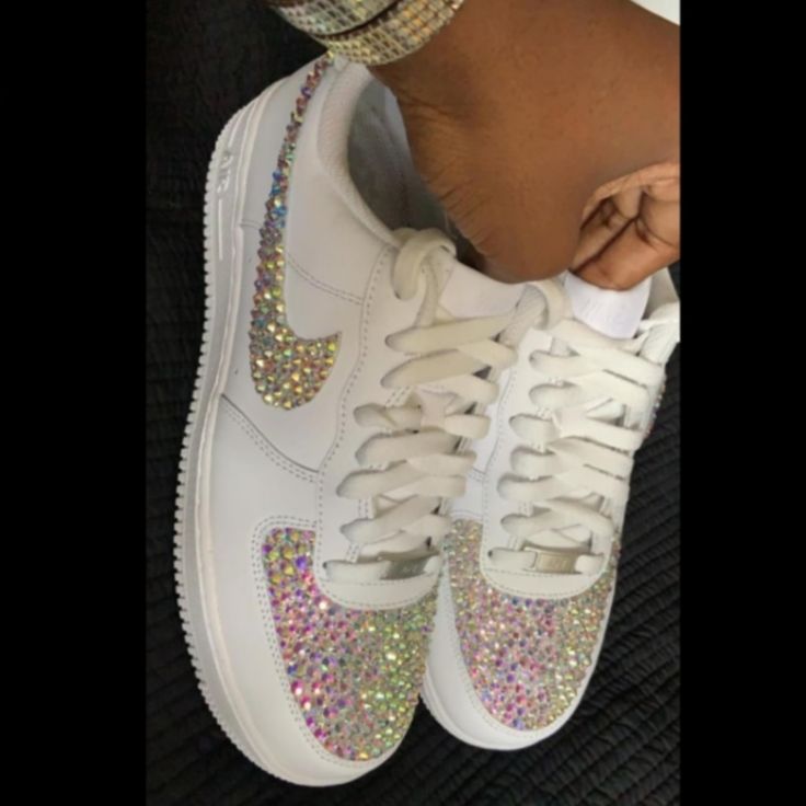 Custom Bling Out Ab Crystal Nike Air Force 1s. Each Shoe Is Hand Designed With Crystals Being Placed One By One, Making This A Time Consuming Process But The End Result Is Truly A Stunning Work Of Art & Worth Every Penny. Please Be Aware That Processing Time Is 2 Weeks & This May Vary Depending On The Shoe & Design Being Done. Sneakers May Be Shipped Without The Box If Doesn't Fit Once Wrapped. Shoes Will Be Packaged Securely. More Glass Crystals Available. Please No Offers. Made To Order. Blinging Shoes Diy, White Low-top Custom Sneakers With Bling, White Custom Sneakers With Bling, Round Toe, White Custom Sneakers With Rhinestones And Round Toe, White Custom Lace-up Sneakers With Rhinestones, Low-top White Sneakers With Bling, White Low-top Sneakers With Bling, White Lace-up Custom Sneakers With Rhinestones, White Bling Lace-up Sneakers