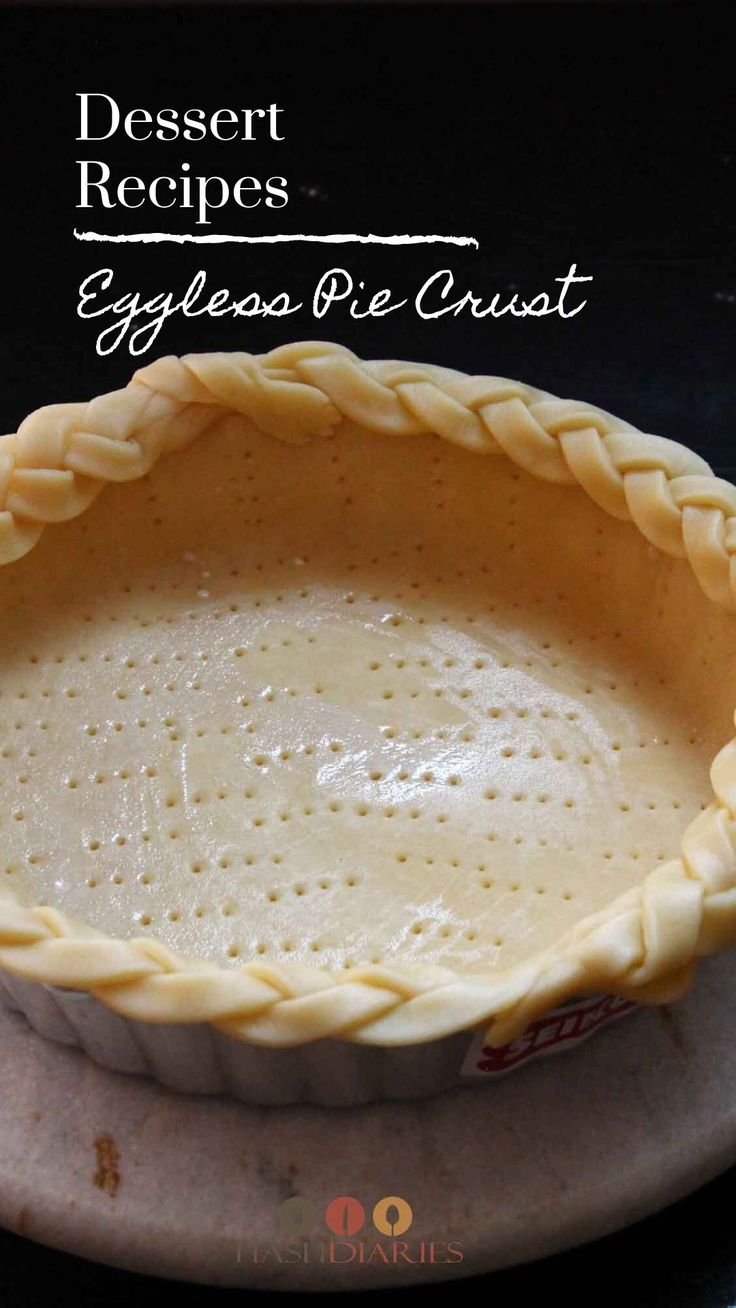 an eggless pie crust on a plate with the words dessert recipes written above it