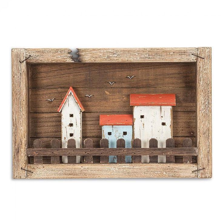 a wooden frame with two houses and birds on the top, one is painted red and white